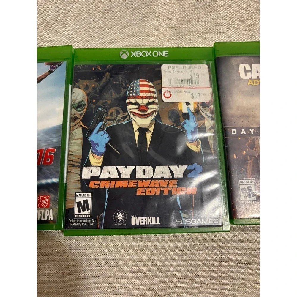 three Xbox One video games Payday, call of duty ,madden